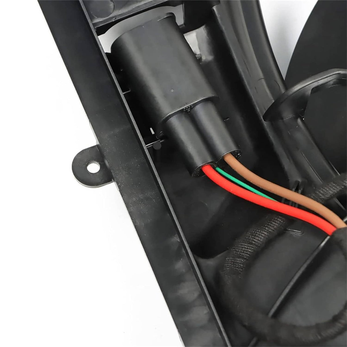 Mercedes-Benz radiator cooling fan housing with black shroud and red/green wire