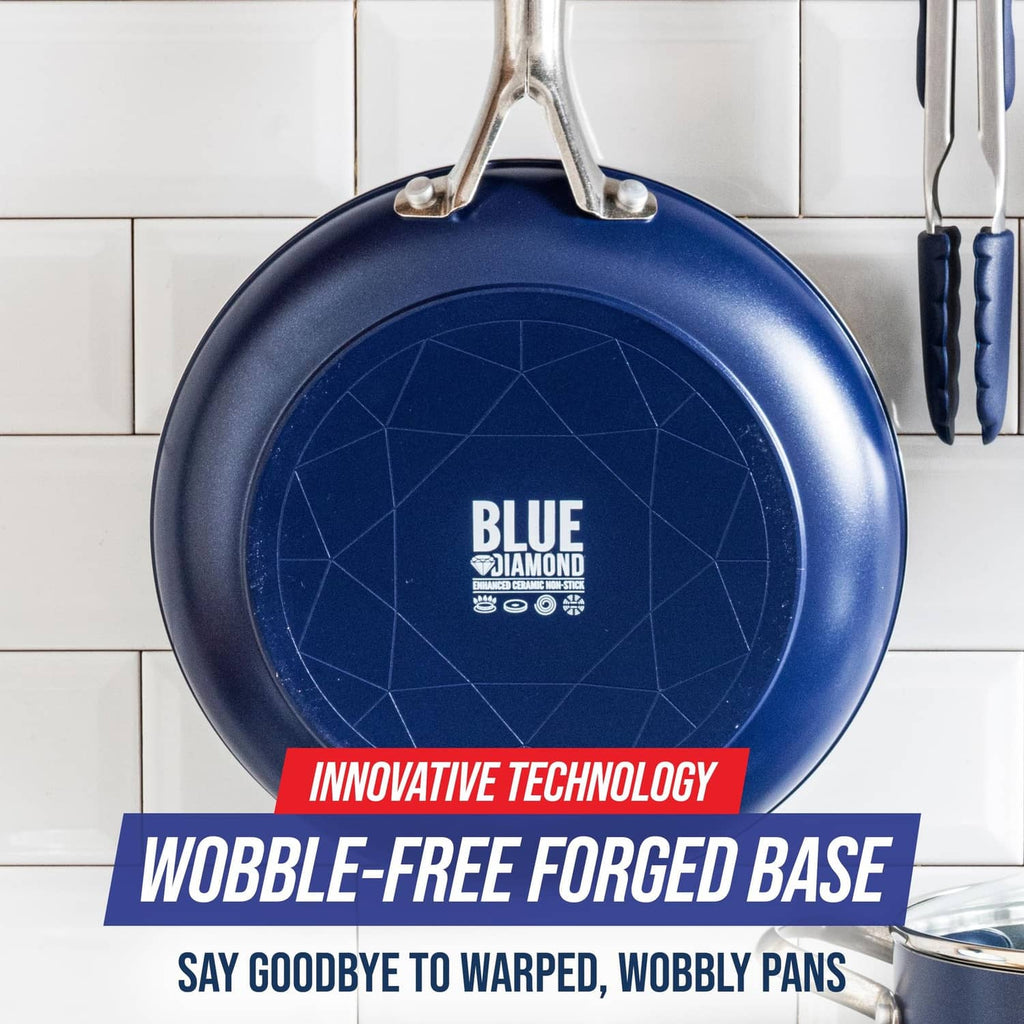 Blue frying pan bottom with geometric pattern and centered logo