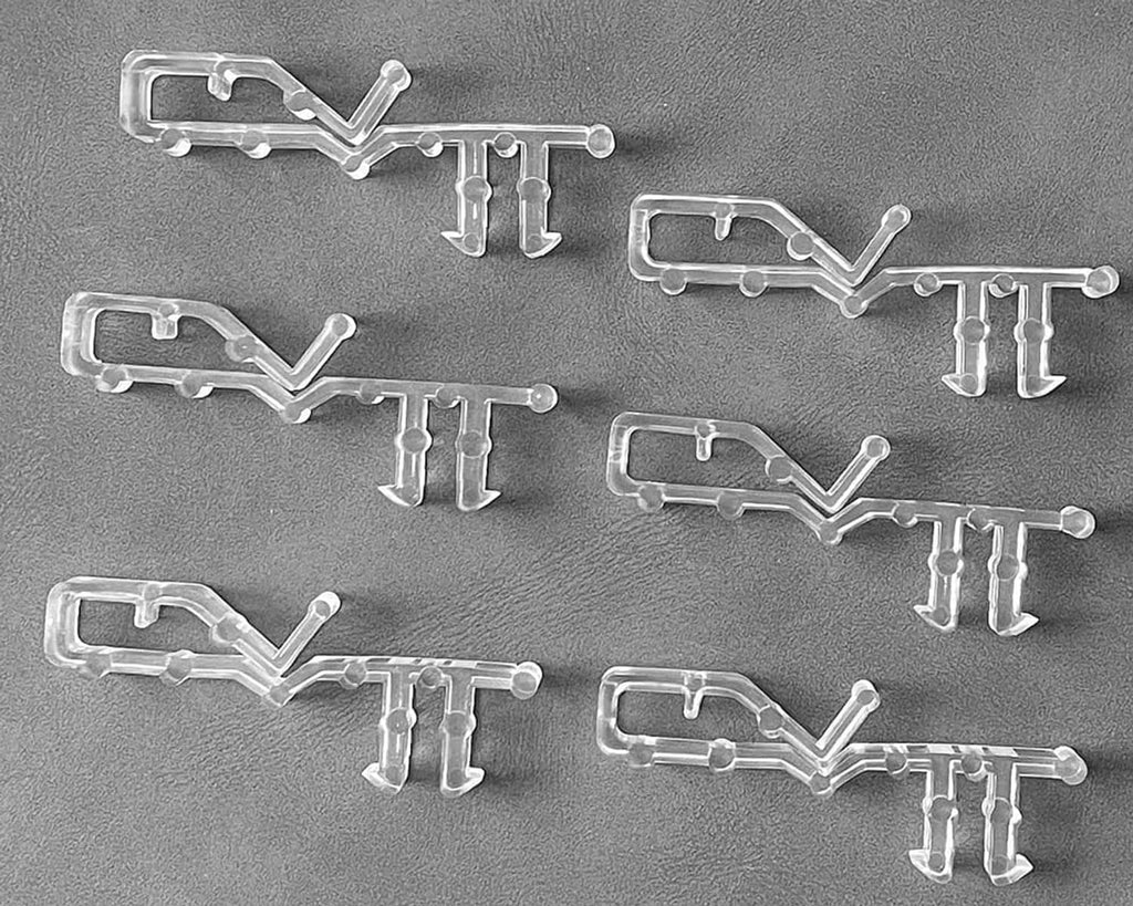 20-pack silver hidden channel valance clips, close-up of metal latch and prongs
