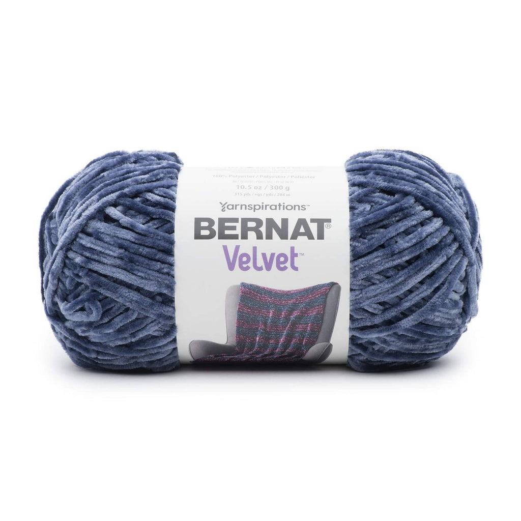 Velvet yarn skeins in dark blue indigo, two skeins with center label