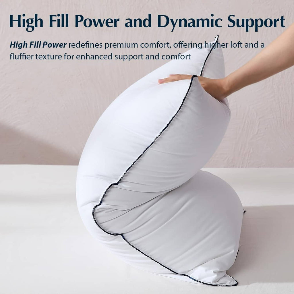White down fiber pillow rolled to show dynamic support, dark edge piping