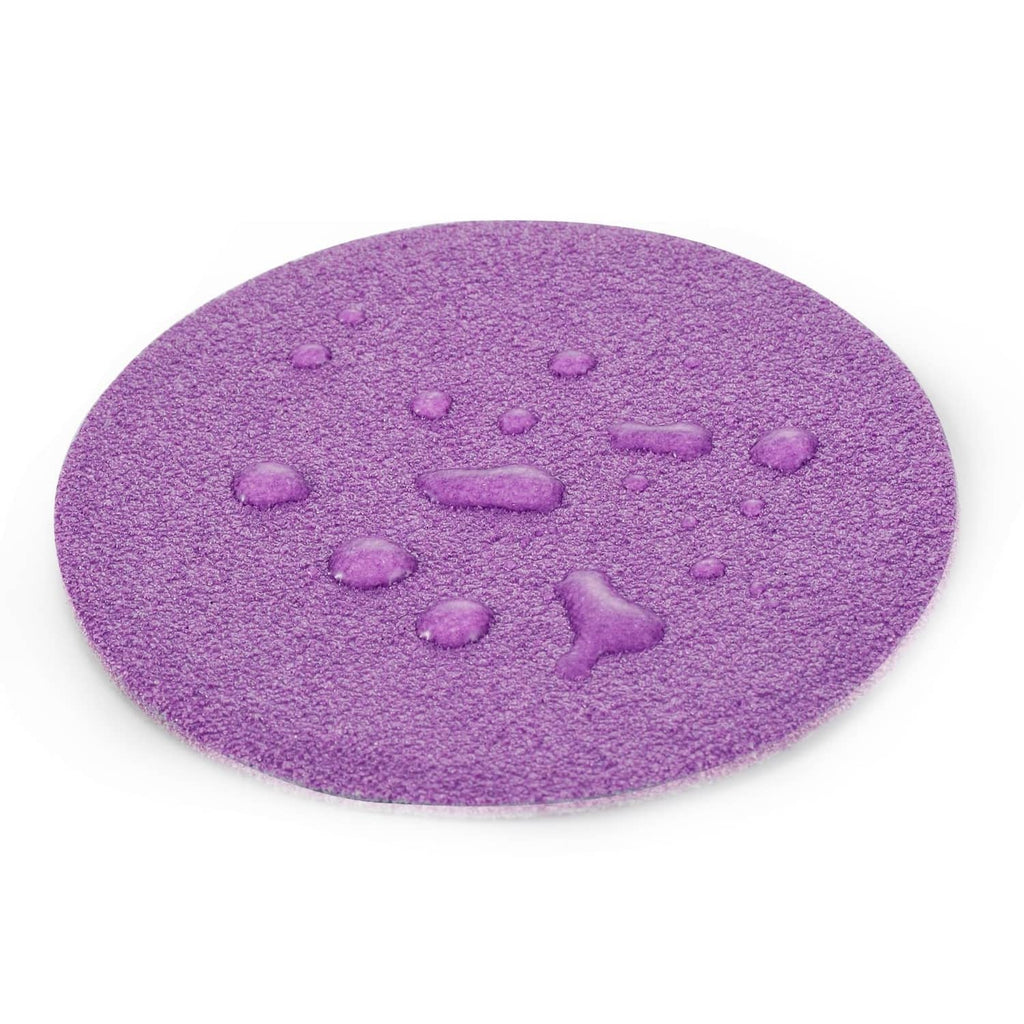 Purple 3-inch sanding disc with dotted abrasive surface, hook-and-loop type