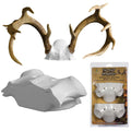 Antler mounting kit with white skull plate and two dark antler spreaders.