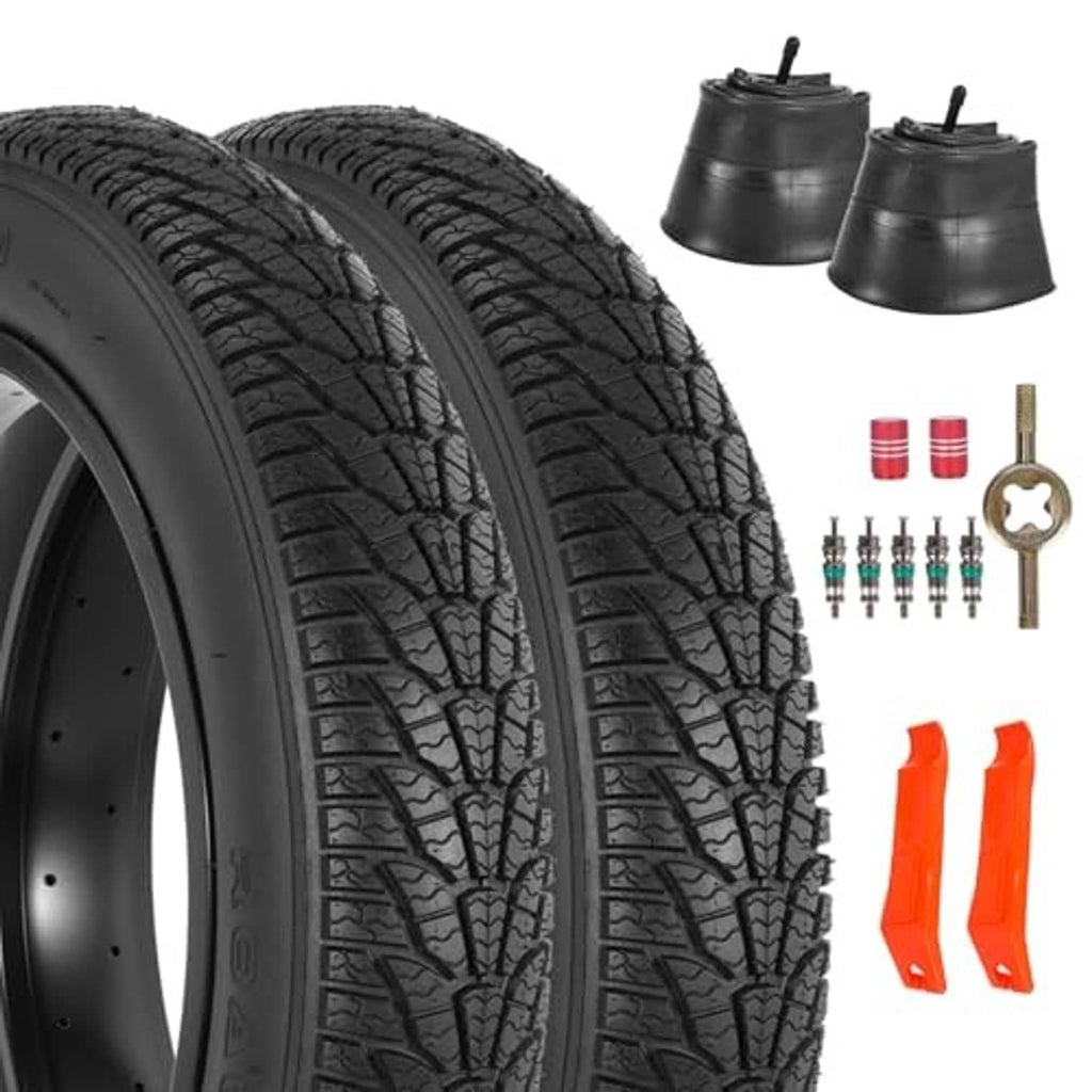 Pair of black fat bike tires with thick tread and wide sidewall, angled close-up