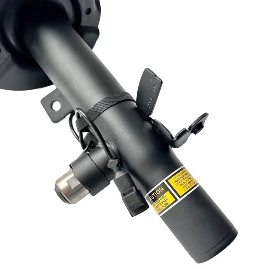 Shock strut assembly with black cylinder body and electrical connector plug
