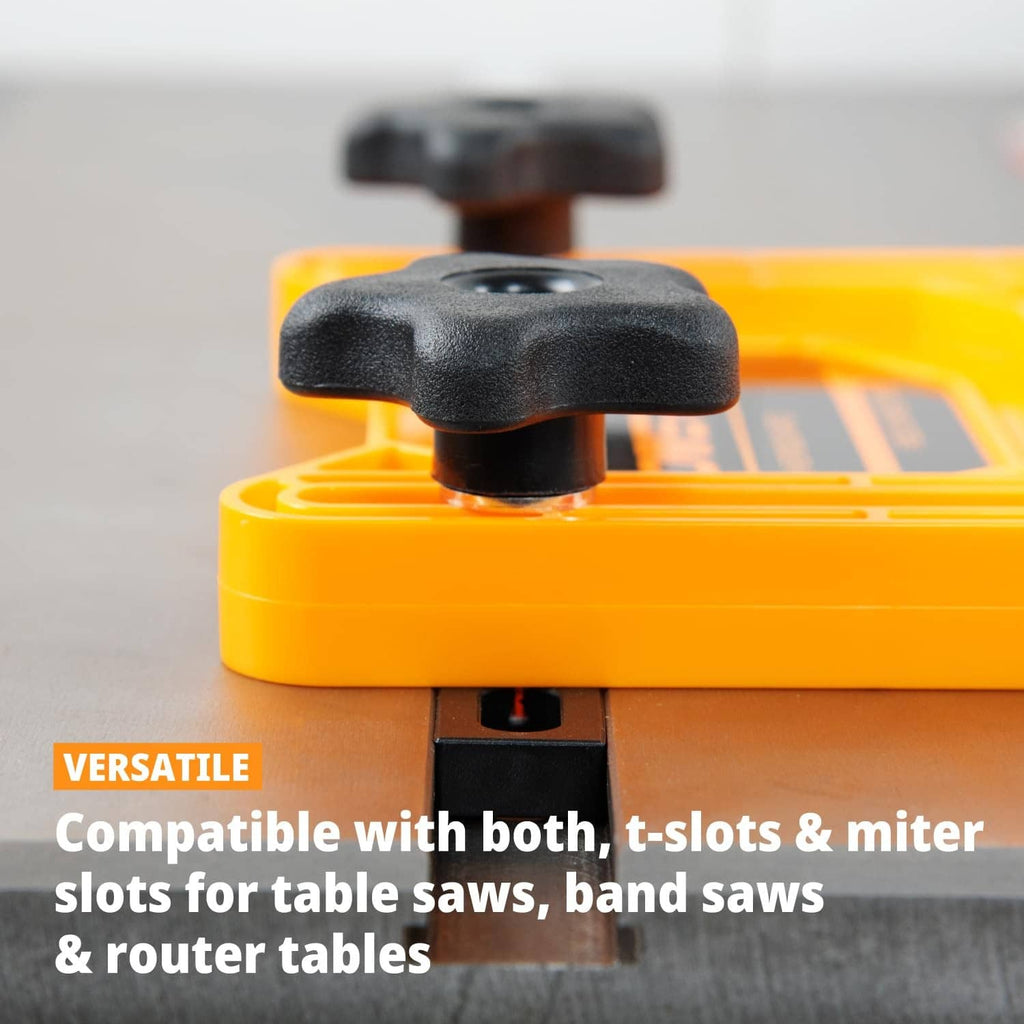 Orange featherboard with black locking knob on top, close-up