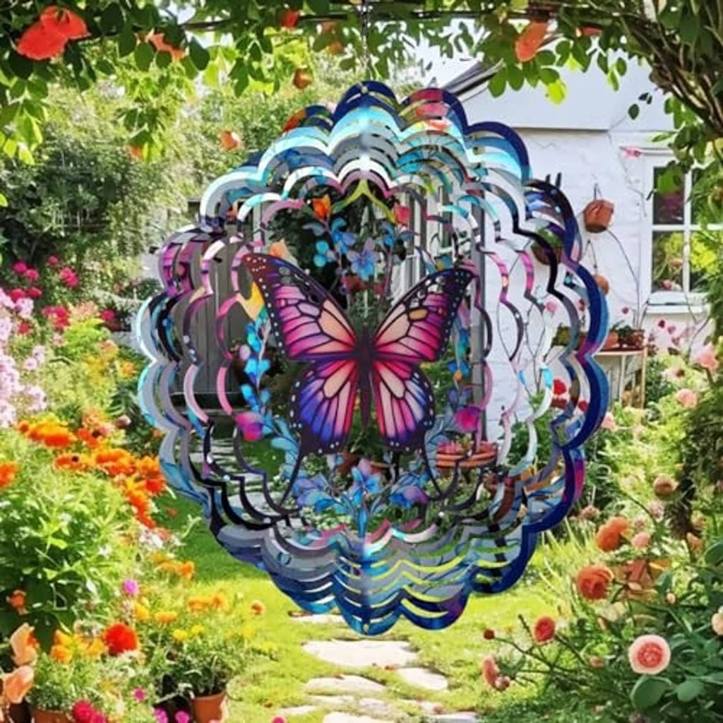 Butterfly wind spinner hanging in a garden, multicolor reflective metal spiral frame