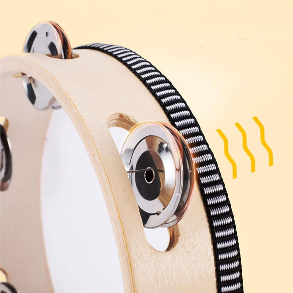 Close-up wooden tambourine with silver jingles and black-and-white striped strap