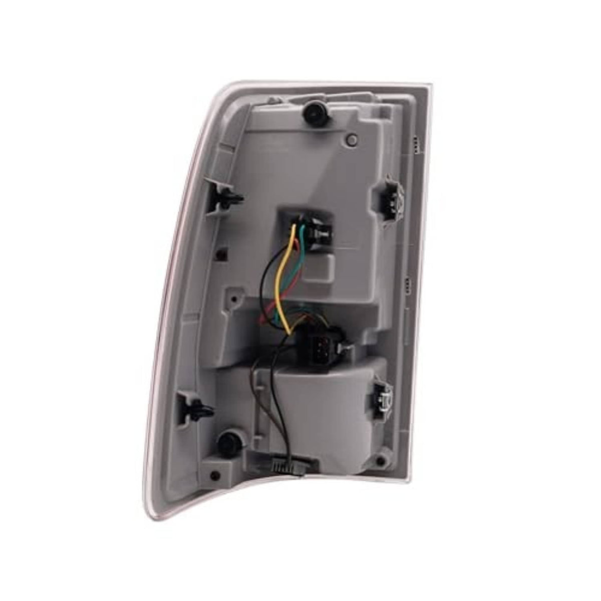 Tail light housing interior with bulb sockets, wiring, and connector ports.