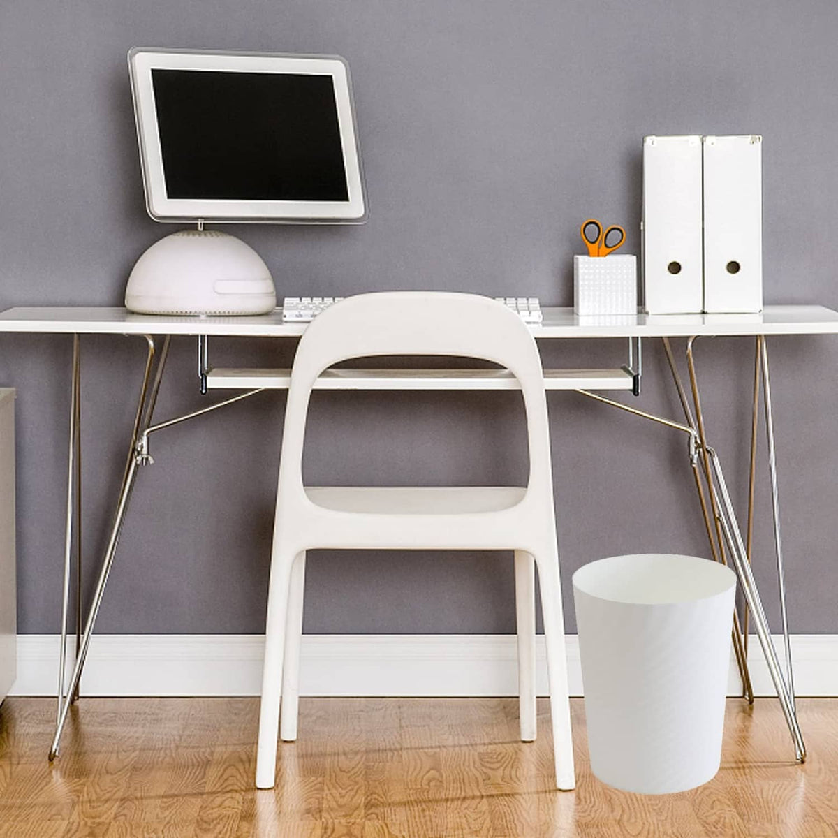 White plastic small wastebasket with open top and ridged outer surface