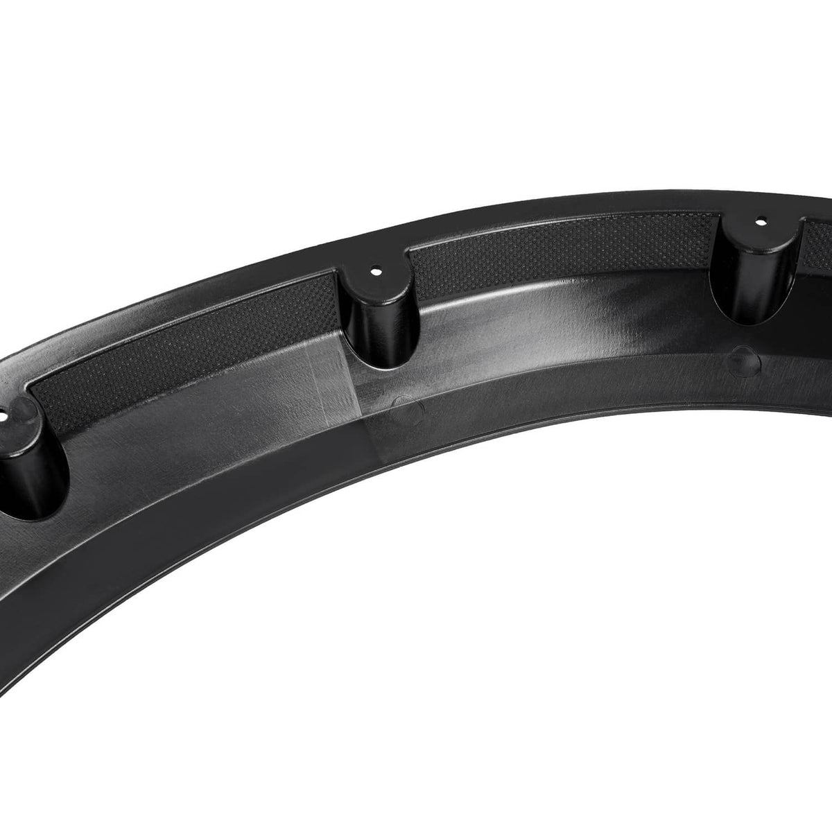 Black curved fender flare with ridged texture and clip brackets on the inner edge.