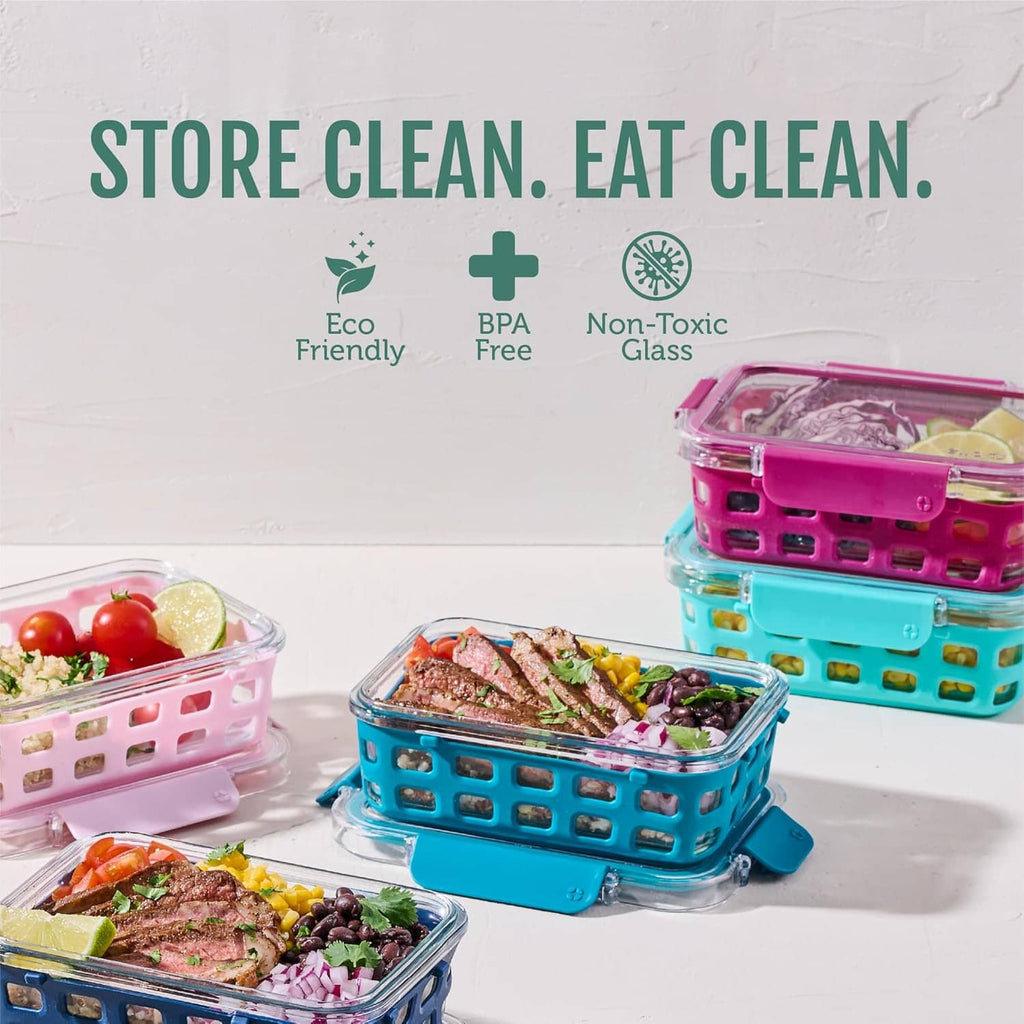Glass food storage containers with snap lids in pink and teal, nested for meal prep