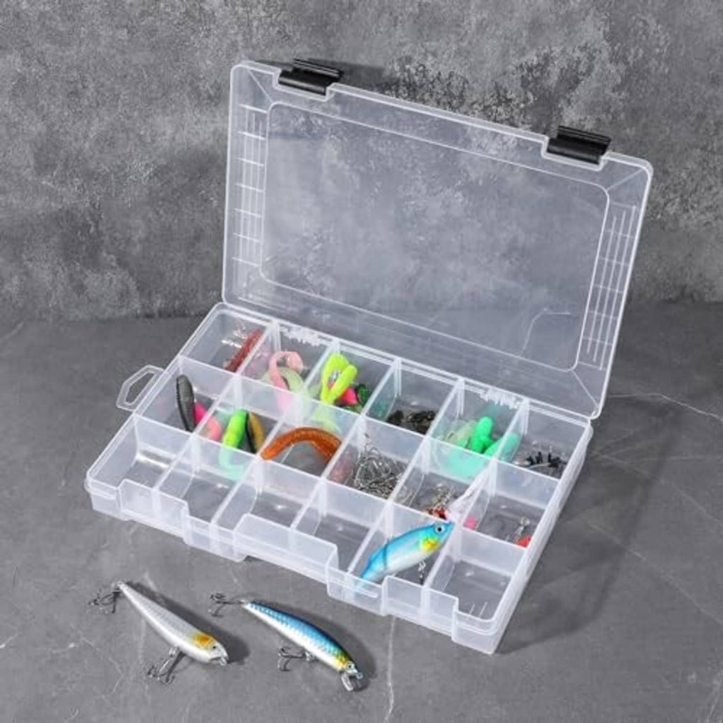 Clear tackle storage organizer with removable divider grid and black latches, open