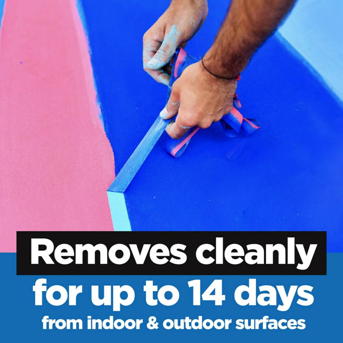 Painter's tape strip applied along a wall edge for clean removal up to 14 days