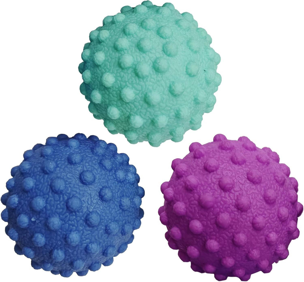 Three spherical foot massage balls with raised bumps in teal, blue, and purple