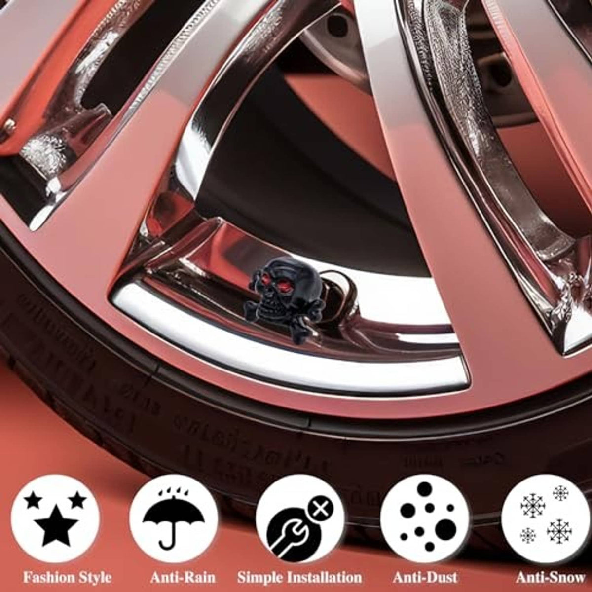 Black skull tire valve stem cap mounted on a red-and-chrome alloy wheel