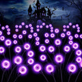 Solar Halloween stake lights with purple glowing circular LED heads, 10-pack
