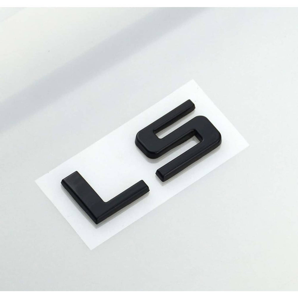 Gloss black LS emblem badge pair, two raised letters on white backing.
