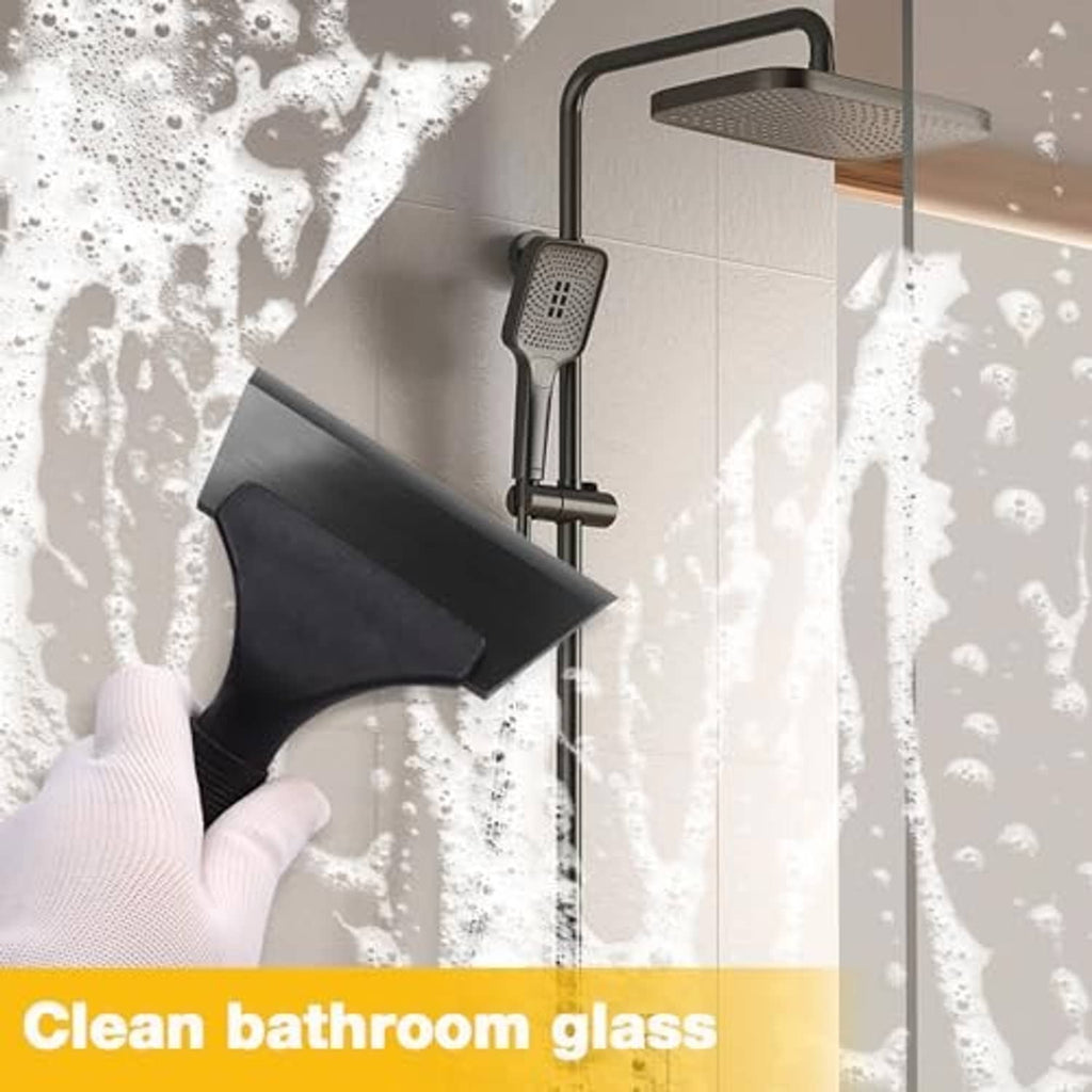 Black squeegee pressing cleaner off bathroom glass surface