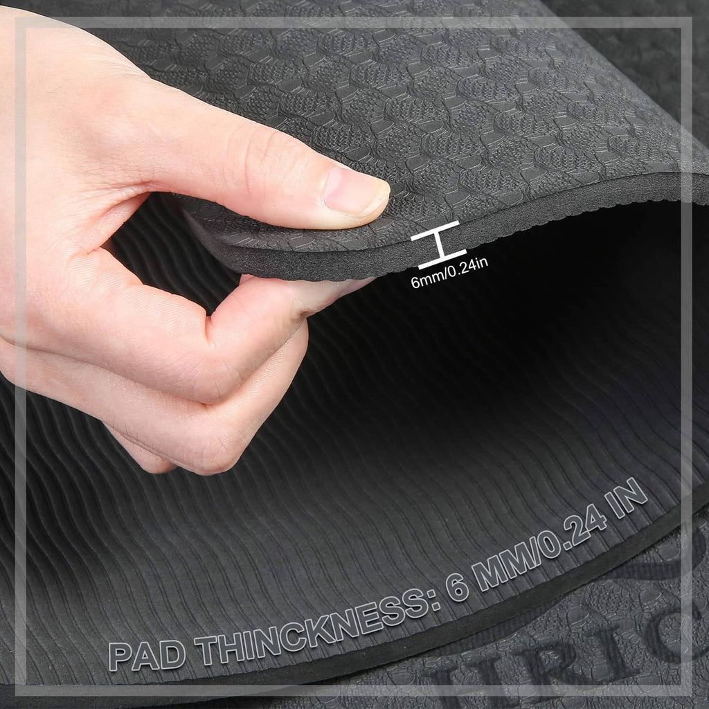 Hands folding a black guitar work mat showing thick, flexible padding