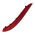 Red rear bumper reflector lens with black mounting base and attachment clips