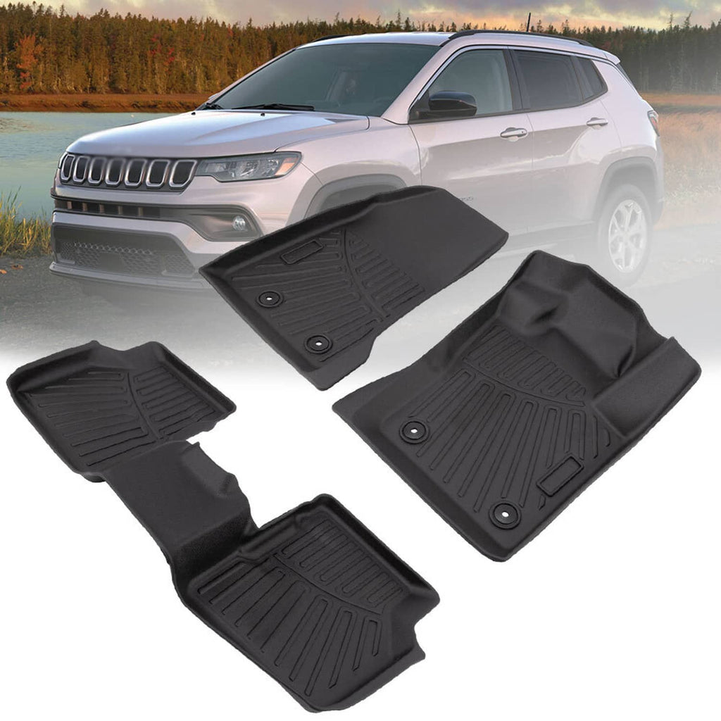 Black front and rear floor mats featuring molded ridges and circular retention holes