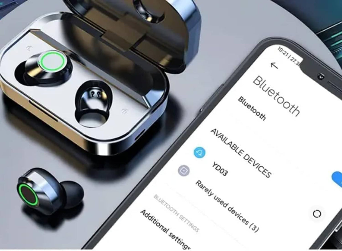 Black earbuds in open charging case with green LED rings, plus Bluetooth phone screen