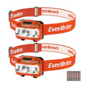 Two kids headlamps with orange elastic straps and rectangular light modules; includes batteries.