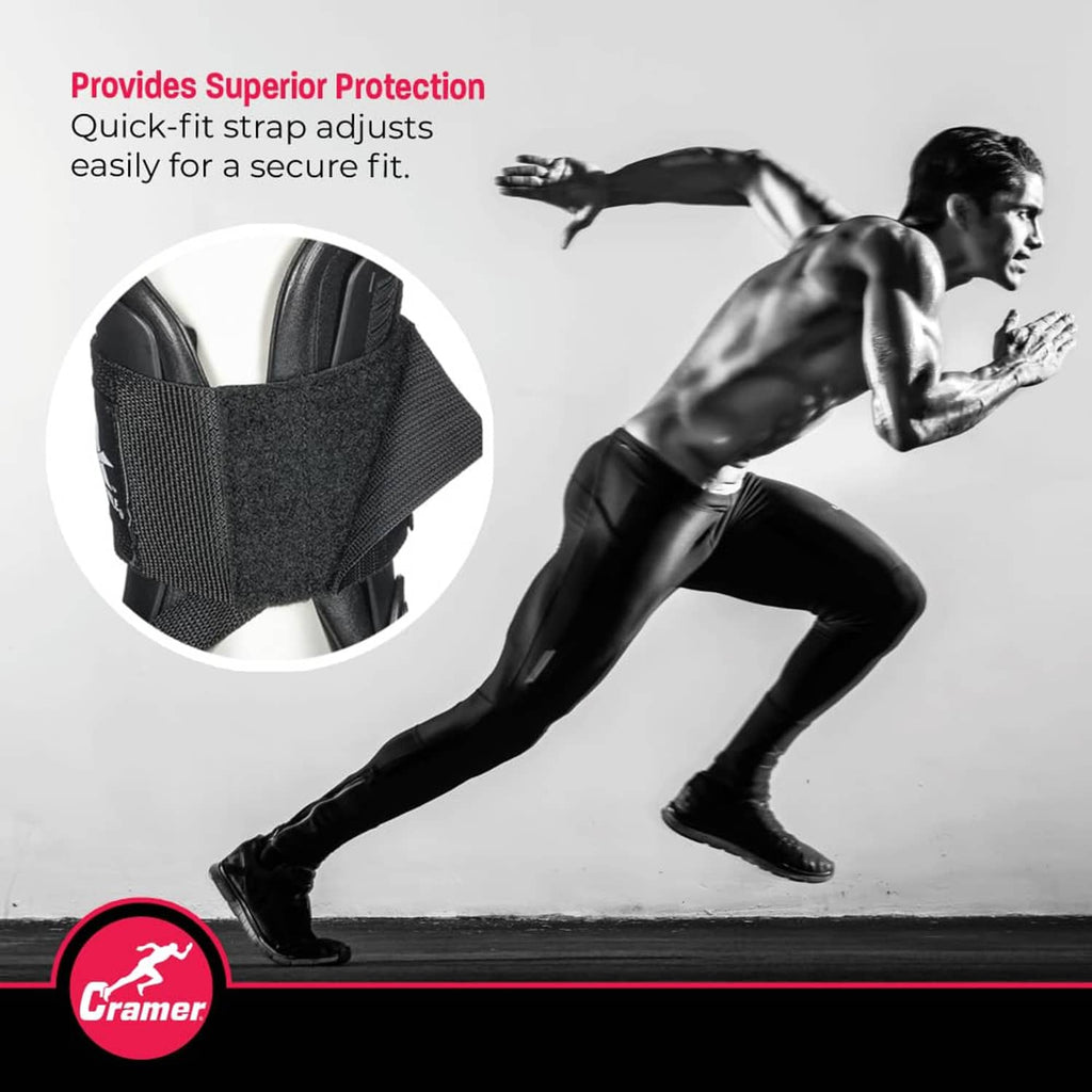 Black ankle brace with textured strap and molded shell on model's leg