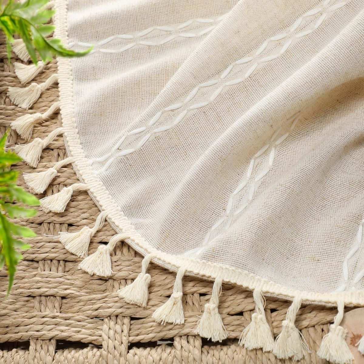 Beige linen-look curtain fabric with diamond lattice embroidery and short tassel trim
