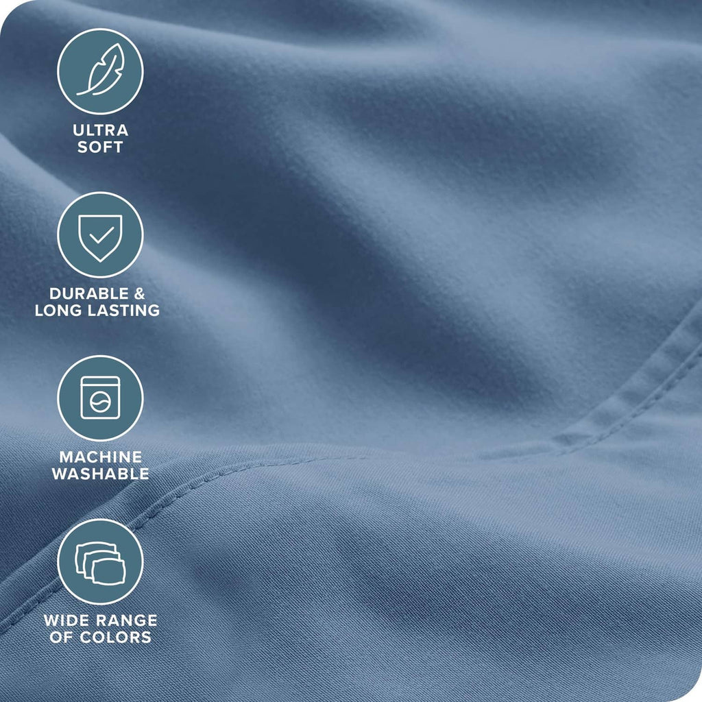Blue microfiber sheet fabric close-up with smooth, durable texture
