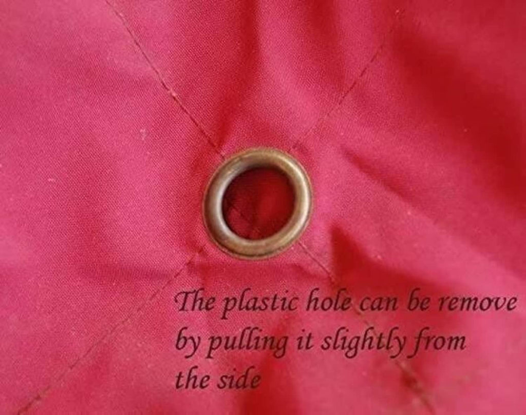 Red canopy fabric with removable plastic grommet ring near center hole