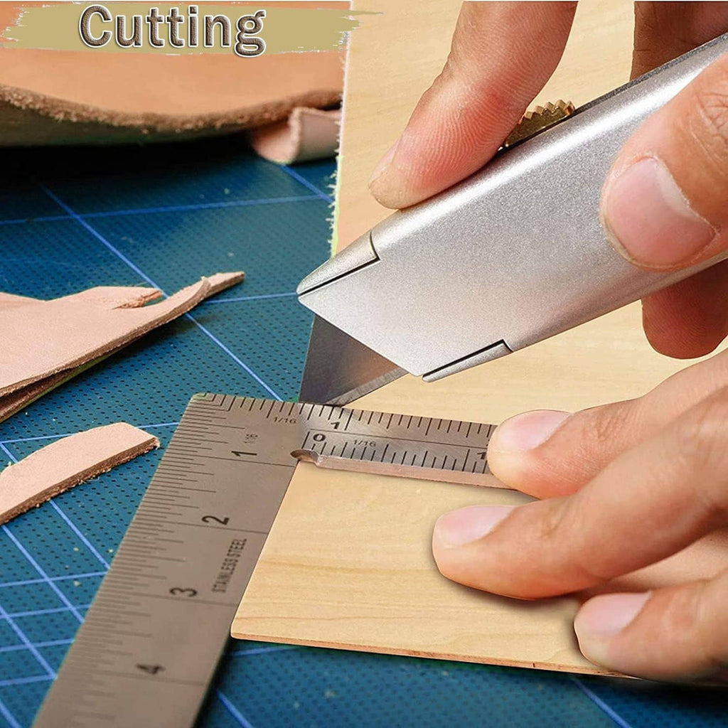Hand cutting a light basswood sheet with a craft knife on a cutting mat