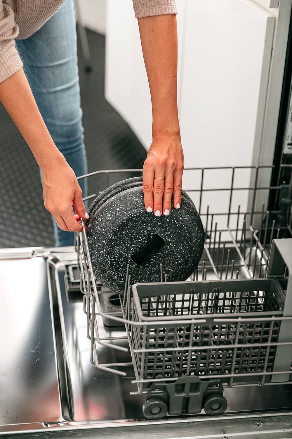 Granite-pattern tortilla warmer with lid placed in a dishwasher rack