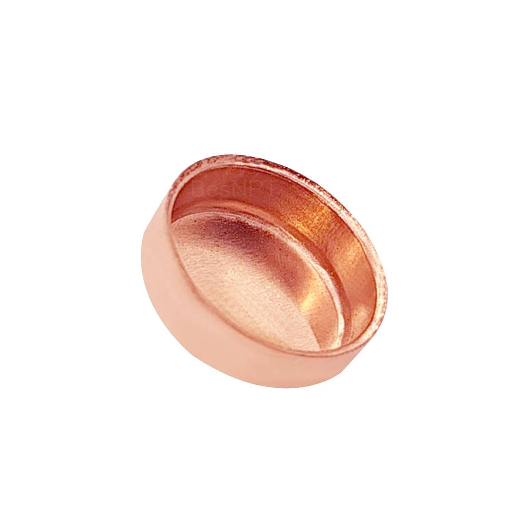 Copper sweat plug end cap from side angle, open cup underside visible