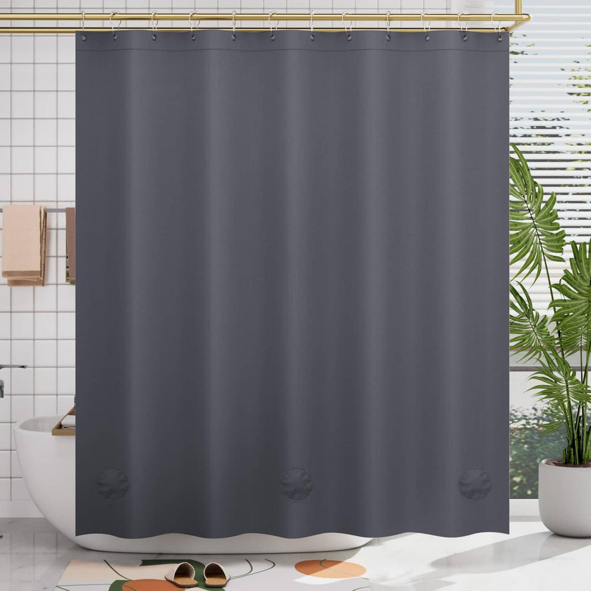 Dark grey shower curtain with small bottom motifs and straight top hanging edge