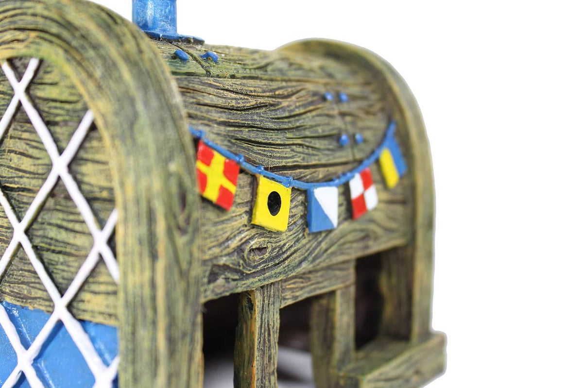 Wooden aquarium ornament side with arched window, colorful bunting and blue detailing