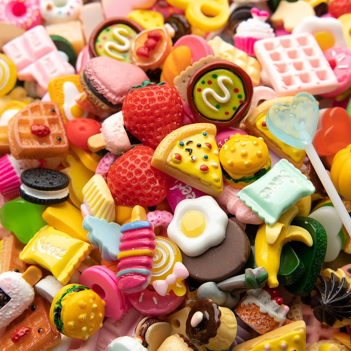 Assorted cute resin food charm mix, colorful mini pastries, waffles, drinks, and sweets