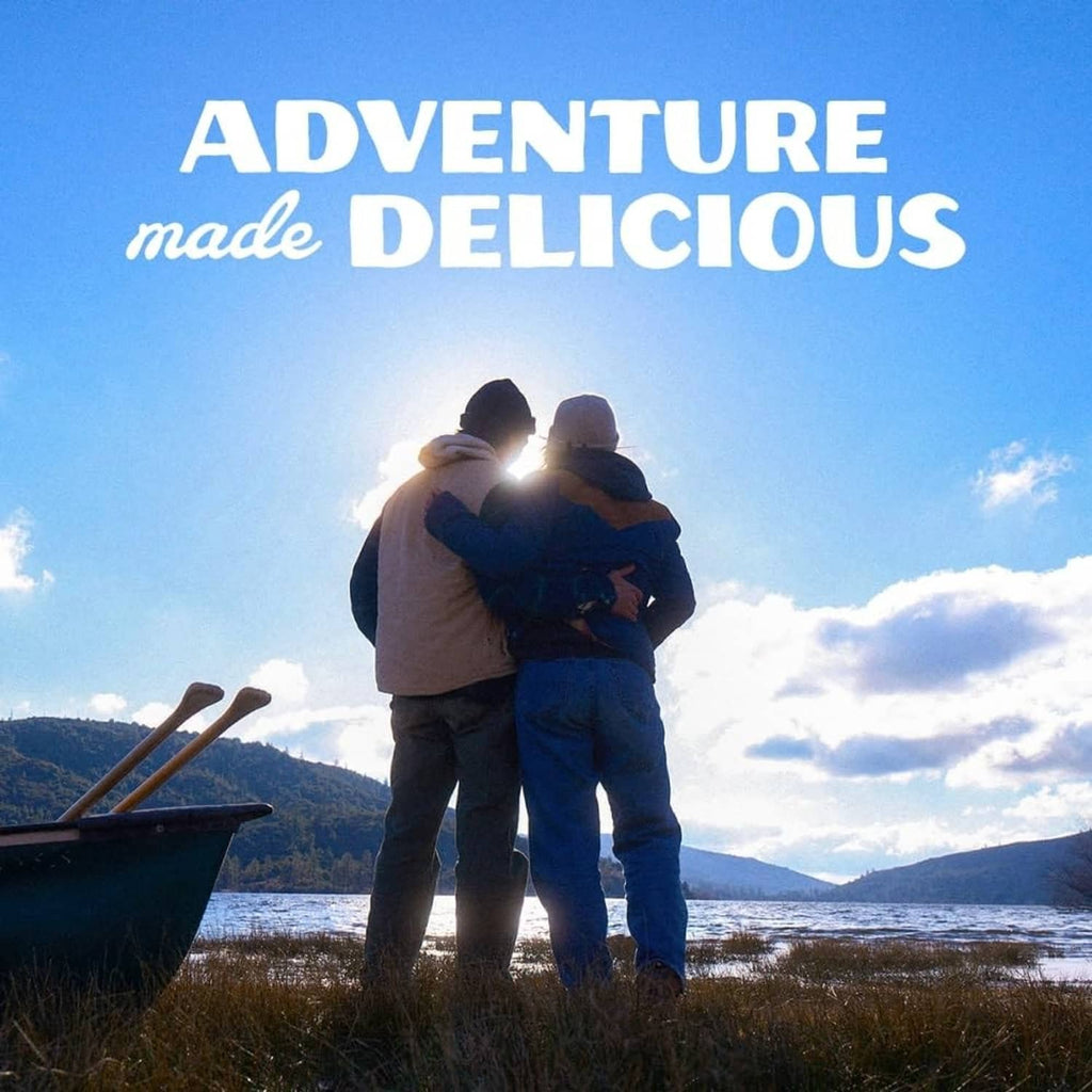 Mountain House freeze-dried diced chicken meal; campers stand near a boat by shore