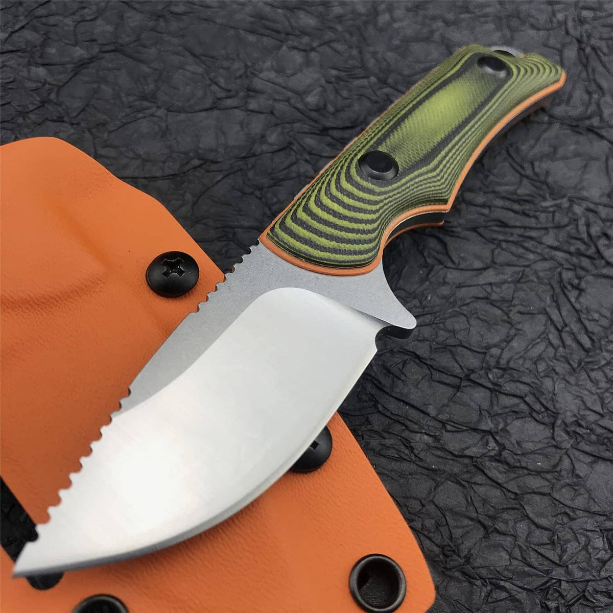 Fixed blade knife with orange Kydex sheath, green handle, black fasteners visible