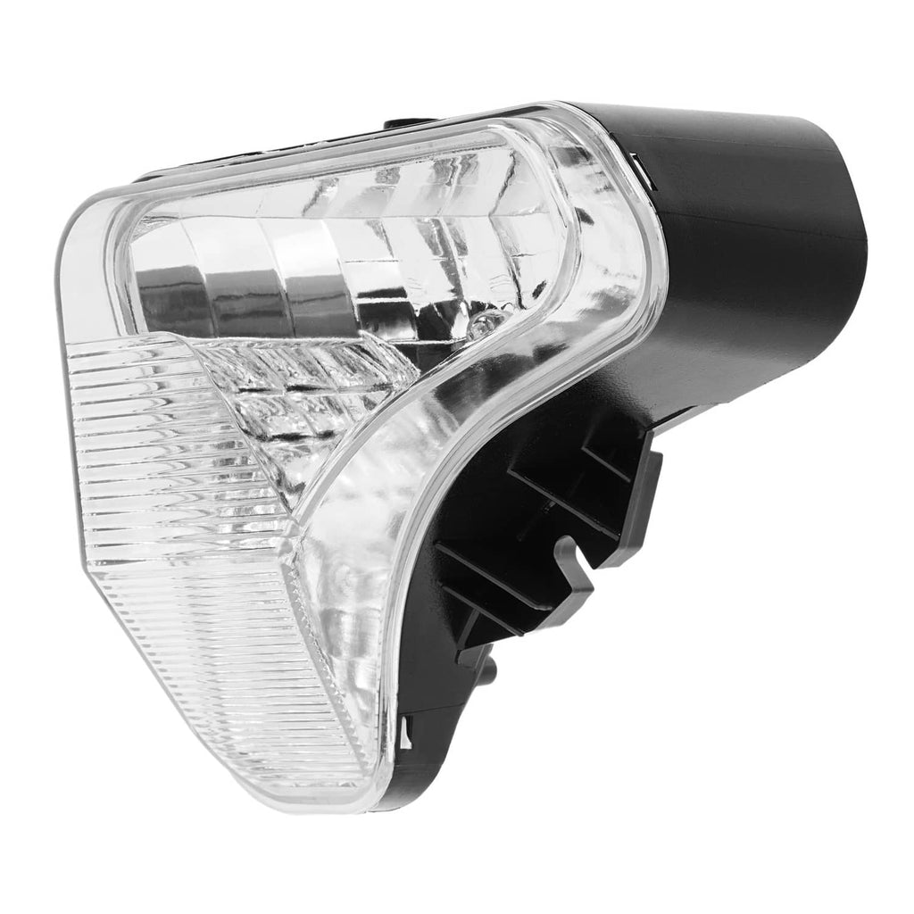Right headlight lamp close-up with clear lens, chrome reflector, and black housing