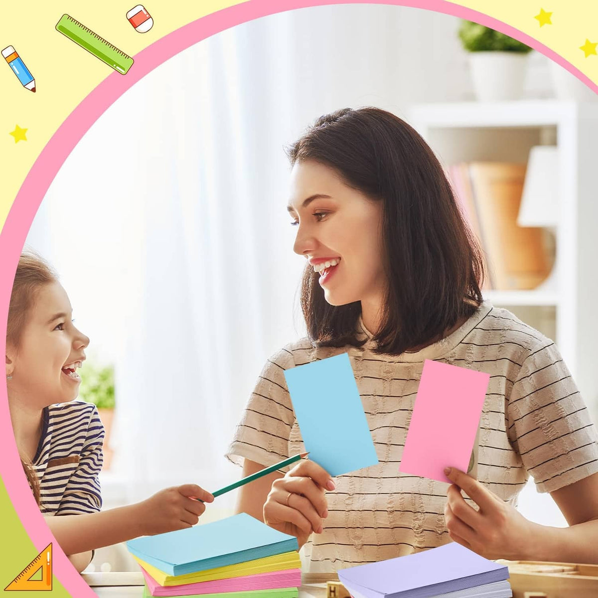 Blank multicolor 4x6 index cards held by a parent and child
