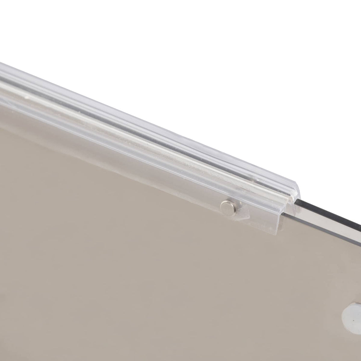 Tinted golf cart windshield windscreen close-up: clear edge strip and mounting holes
