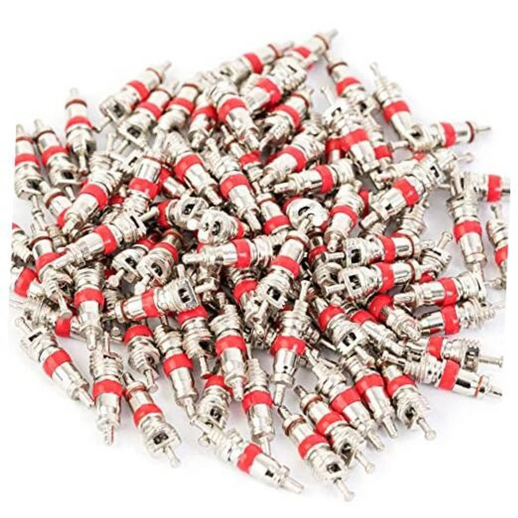 Set of tire valve cores with red seals and chrome metal stems, assorted pieces