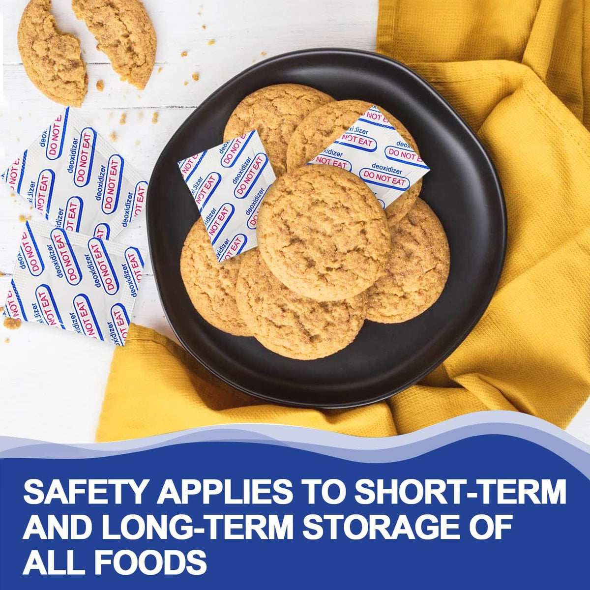 Oxygen absorber sachets tucked near cookies on a black plate
