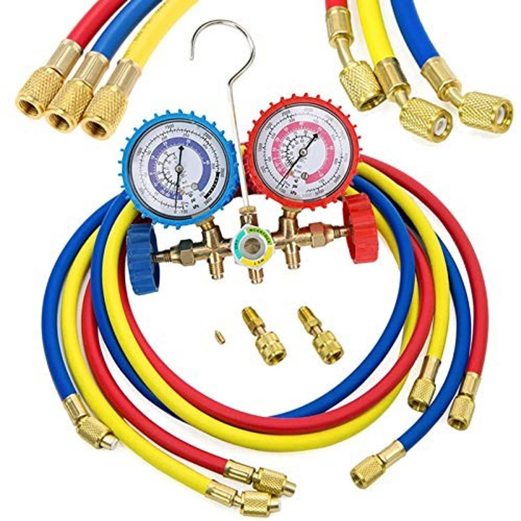 Refrigerant charging hoses with blue and red pressure gauges and brass manifold fittings