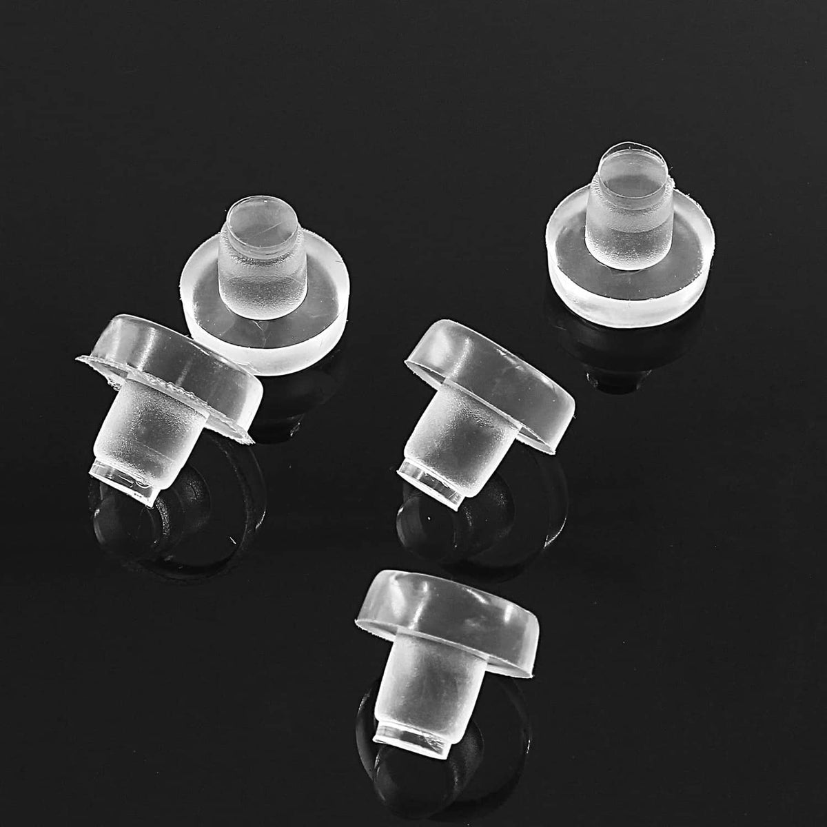 Clear plastic table bumpers with stems, set of small caps