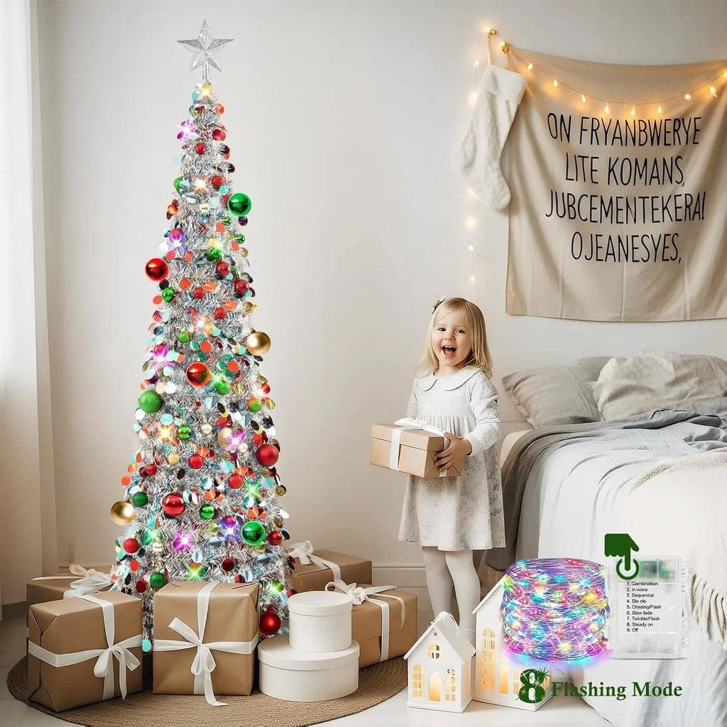 Silver tinsel pop-up Christmas tree with star topper, multicolor ornaments, and glowing LED lights
