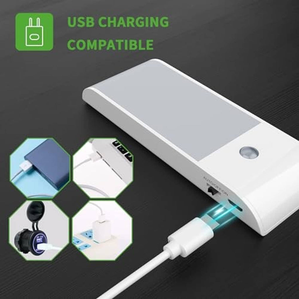 White rechargeable LED light bar with USB charging cable connection and charging indicator.