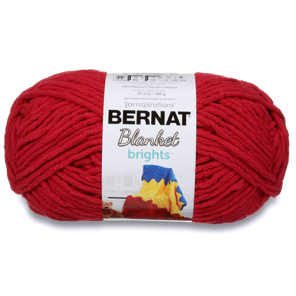 Red super bulky chenille yarn skein with Bernat Blanket label